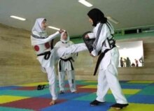Iran -- sports (women, tae kwon do training for Asian Games in 2002)