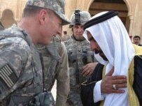 U.S. commander General David Petraeus (left) with Sheikh Abd al-Sattar Abu Rishah, who was killed by Al-Qaeda in September (AFP)