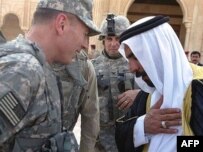 Al-Anbar provincial tribe leader Sheikh Abdul-Sattar Abu Risha with U.S. commander General David Petraeus (file photo)