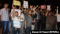 ناشطون في النجف يطالبون باقالة وزير الدفاع