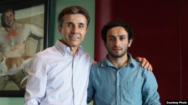 Bidzina Ivanishvili (left), leader of the Georgian Dream opposition coalition, and Georgian judoka Betkil Shukvani, posed for a photograph ahead of the Olympics.