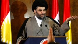 Iraq -- Shi'ite cleric Moqtada al-Sadr speaks during a press conference in the northern Kurdish city of Irbil, 26Apr2012
