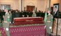 An honor guard stands by Niyazov\'s coffin in Ashgabat as mourners file past (AFP)