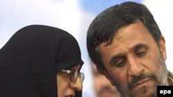 Ahmadinejad with his wife at an election campaign rally in Tehran on June 2