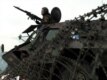 A German soldier of the NATO-led forces in Bosnia secures a checkpoint near the town of Pale in 2004