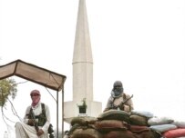 Militants guarding the mosque on July 3 (epa)