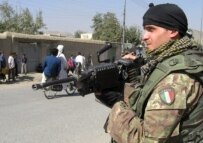 An Italian ISAF soldier outside a school in Kabul (file photo) (epa)