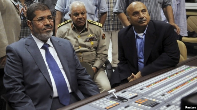 Morsi prije obraćanja na nacionalnoj televiziji, 23.11.2012.