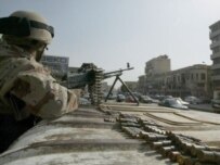 An Iraqi soldier at a checkpoint in Baghdad on February 6 (epa)