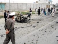 Afghan police at the site of a suicide attack in Kandahar in March (epa)