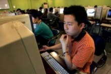 China - Using internet at an internet cafe in Beijing, 18 May 2005