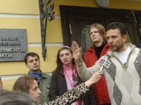 Russian activists speak to the media after disrupting a speech by Estonia's ambassador today (ITAR-TASS)