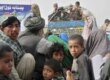 Afghan refugees return from Pakistan in April 2007 under a UN-backed voluntary-repatriation plan