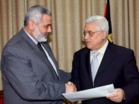 Prime Minister Haniyah (left) with President Abbas on March 15 (epa)