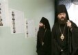 Orthodox priests consult candidate lists in the capital