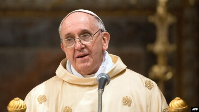 Pope Francis leads a mass at the Sistine Chapel in the Vatican on March 14.