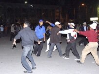 Demonstrators threw rocks and bottles at the government building on April 19 (ITAR-TASS)