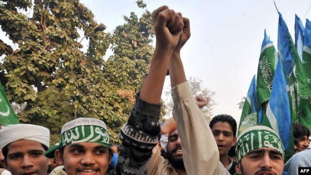 Pakistani students march as they shout anti-Indian slogans in Lahore.