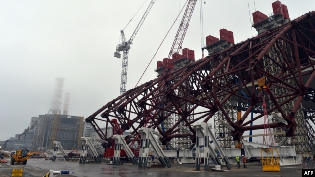 The first section of a colossal arch-shaped structure that will eventually cover the exploded reactor at the Chornobyl nuclear power station.