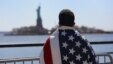 An immigrant looks toward New York