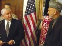 Gates (left) with Aghan President Karzai in Kabul (epa)