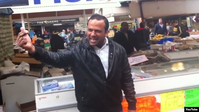 Pakistani-born fishmonger Muhammad Shahi Nazir sings in the YouTube "One-Pound-Fish Man" video from a London fish market.