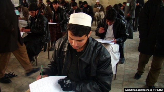 Recent graduates take university entrance exams in Kabul in 2011.