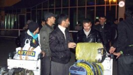 A group of Tajik migrants who were deported from Moscow to Dushanbe last week. 