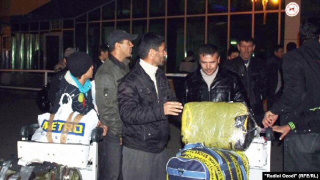 A group of Tajik migrants who were deported from Moscow to Dushanbe last week. 