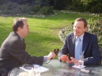 U.S. Ambassador Robert Bradtke (right) and RFE/RL correspondent Enis Zebic (RFE/RL)
