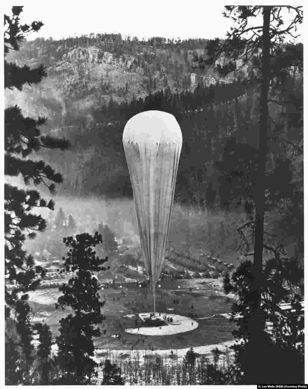 The National Geographic-Army Air Corps stratosphere balloon "Explorer II" prepares to rise from the Stratobowl near Rapid City, South Dakota on November 11, 1935. It carried two “aeronauts” more than 22,000 meters into the stratosphere -- the highest humans would go for the next 21 years.