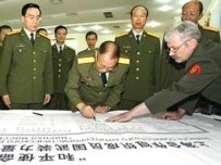 Chinese Defense Minister Cao Gangchuan (center) at today's meeting (AFP)