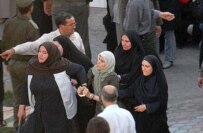 Demonstrators at a women's rights rally in Tehran on June 12 that was violently broken up (kosoof.com)