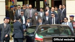Egyptian President Mohamed Mursi (center right), welcomed Iranian President Mahmud Ahmadinejad (gesturing) in Cairo in February.