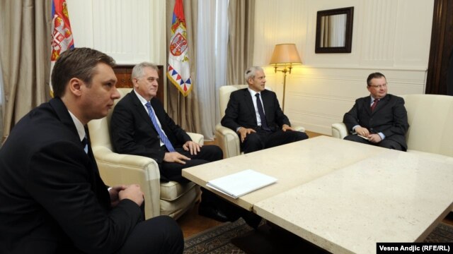 A meeting in late May of newly elected President Tomislav Nikolic (second from left), former President Boris Tadic (second from right) and (right) Ivica Dacic in Belgrade.
