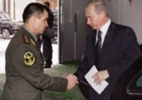 Interior Minister Rashid Nurgaliev (left) with President Putin (file photo) (epa)