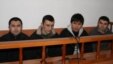 Четверо из группы узбекских беженцев-мусульман, которые были экстрадированы из Казахстана, во время суда над ними. Алматы, 11 марта 2011 года.