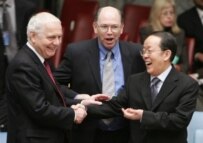 British UN Ambassador Emyr Jones Parry (left), acting U.S. Ambassador Alejandro Wolff (center), and Chinese Ambassador Wang Guangya before today's vote (AFP)