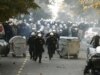 In Wake Of Riots, Belgrade On Edge Ahead Of Clinton Visit