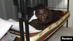 A prisoner at Guwasim prison near Gharyan, 75 kilometers south of Tripoli