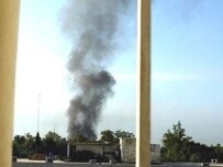 Smoke billows from the Red Mosque complex on July 10 (AFP)