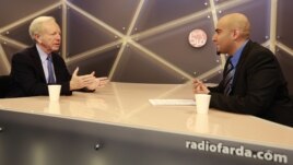 U.S. Senator Joseph Lieberman (L) during an interview with Radio Farda's Niusha Boghrati (R), 26Aug2012