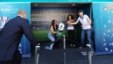 Femen activists make their move with the Euro 2012 trophy on display in the Ukrainian city of Dnipropetrovsk on May 21.
