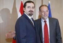 Solana (right) with Saad Hariri in Brussels today (epa)