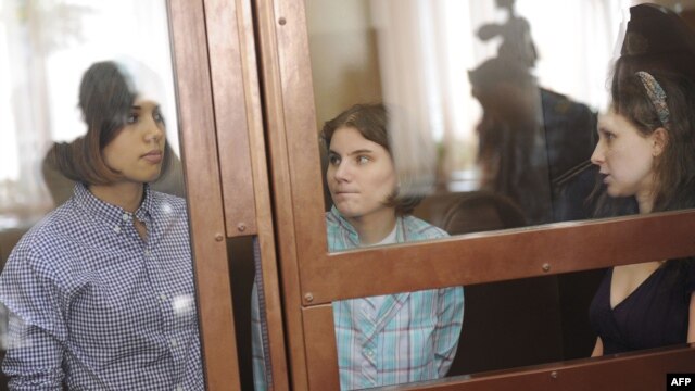 Members of Pussy Riot during a court hearing in Moscow on July 30: Nadezhda Tolokonnikova (left),  Yekaterina Samutsevich (center), and Maria Alyokhina. They face up to seven years in prison.