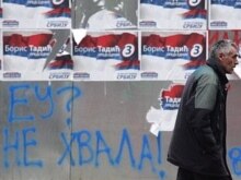 Serbia -- Pre-election posters of the Democratic Party and a graffiti reading 