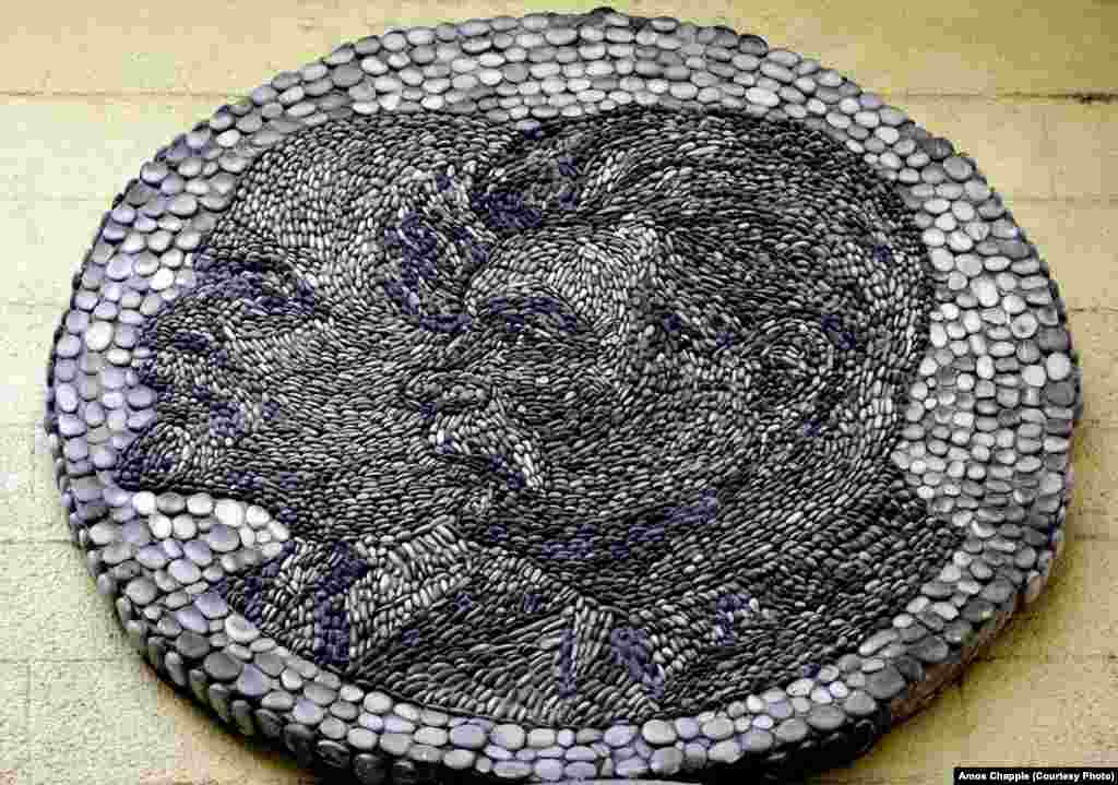 A mosaic of Lenin and Stalin made of river stones at the entrance to Chiatura's main tramway station. Stalin's relationship with Chiatura dates to his days as a revolutionary fugitive hiding out in the mines above the town.