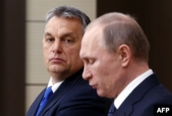 Венгерский премьер-министр Виктор Орбан в тени Владимира Путина. Москва, зима 2016 года