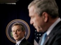 Tony Blair (left) listens as Bush speaks at a press conference in Washington earlier this month (epa)