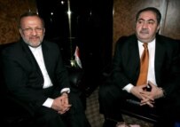 Mottaki (left) and Iraqi Foreign Minister Hoshyar Zebari in Baghdad today (epa)